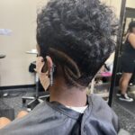 Short pixie cut with barber part